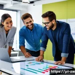 Home 20 지식 관리 시스템 도입 시 유의사항 - A modern corporate office scene featuring a diverse team of professionals collaborating around a lar...